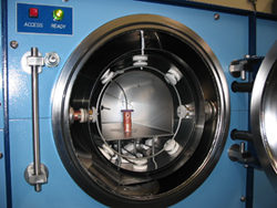 An open G furnace chamber with loaded part and survey thermocouple